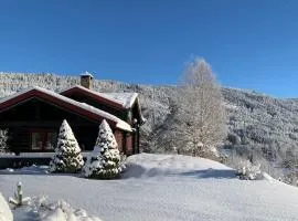 Luxury family house "Berg" with outdoor sauna, hot tub and lake view