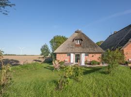 Idyllische kleine Reetdachkate mit Blick über die Felder - Kamin, Terrasse & Privatparkplatz: Simonsberg şehrinde bir otel