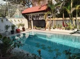 Room 8 Studio in a villa 5mn walk from the Royal Palace with swimming pool
