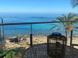 Attico fronte mare Espardell19 Es Pujols, Hotel am Strand in Es Pujols