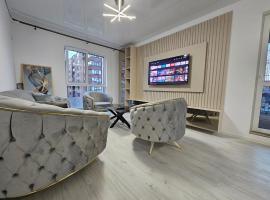 Luxury flat HUB Residence, מלון בChiajna