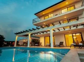Ferienhaus in Malinska mit großem Pool
