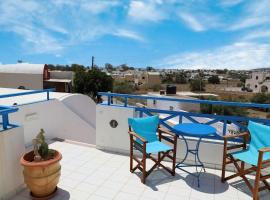 Santorini Seaside Retreat - Flora's Summer Escape โรงแรมในเปริสซา