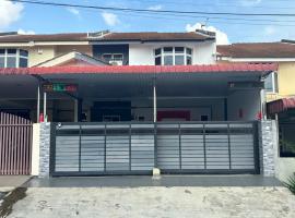 126 Homestay TYPE A, cabaña o casa de campo en Tangkak