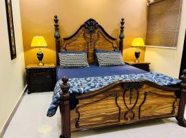 Bahria Town Lahore - NEXT INN Two Bedroom condo with free parking 203, condo in Lahore