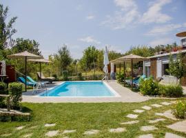 Roxani Aqua Bliss - Serene Garden Getaway, ξενοδοχείο σε Evkarpía