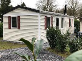 Knus chalet in de bossen van Epe met fietsen, hôtel à Epe