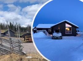 Koselig hytte - Trysilfjellet ski in og ski out 4 soverom, 2 bad, badstue, fiber bredbånd og Elbillader: Trysil şehrinde bir otel