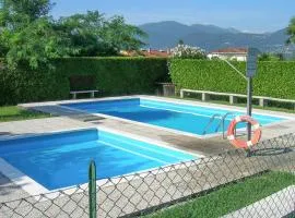 Nice Apartment In Germignaga va With Outdoor Swimming Pool