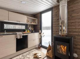 KARPALO Lapland Riverside Cabin with Sauna Fireplace BBQ WiFi Ski Ylläs PetsOK โรงแรมติดทะเลในแอแกชลอมโปโล