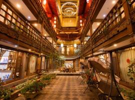 思法特观景客栈 Sifat Viewing Inn: Lijiang şehrinde bir otel