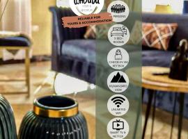 gemütlicher Bungalow x Garten & Terrasse x NETFLiX, ξενοδοχείο σε Moshi