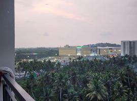 Sharon Holidays - Near KIMS & LULU, hotel conveniente a Trivandrum
