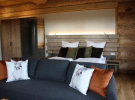 Waldzeit Lodge - Ferienwohnung Hase, hotel en Neuhütten