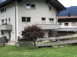 Ferienhaus Bergauf with Hot Tub, hotel s hidromasažnom kadom u gradu 'Neukirchen am Grossvenediger'