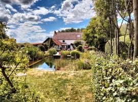 Tuinkamer in charmante smidse, viešbutis mieste Zwalm