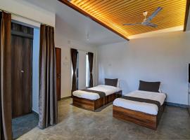 OYO Flagship Welcome Premium، فندق في Khandagiri