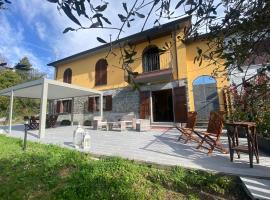 Ca' Degli Ulivi Relax - uso esclusivo con jacuzzi in Lunigiana vicino cinque terre, hotel in Agnino