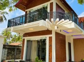 Neems paradise, apartamento em Point Pedro