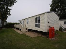 Stunning river view 2 bedroom caravan with decking