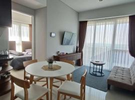 Sea View Family Room at Nuvasa Bay Resort, hotel uz plažu u gradu 'Nongsa'