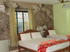 Flavia Paradise Guest House, hotel in Canacona