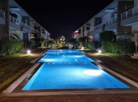Appartement - résidence fermée avec piscines - Sidi Rahal, hotel em Sidi Rahal
