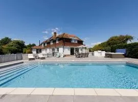 Ultimate beach house with pool in West Wittering