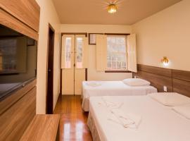 米兰特酒店，位于欧鲁普雷图的带热水浴缸的酒店