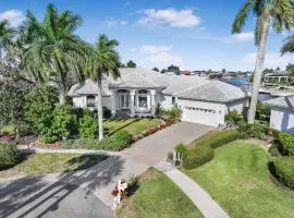 Waterfront home on key lot with pool, spa and views