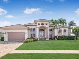 Beachy west exposure waterfront home with pool and spa
