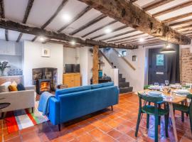 The Plough Wheel by Big Skies Cottages, holiday home in Kelling