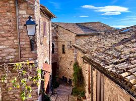 A Passo Lento nel Castello di Collepino, hotel em Spello