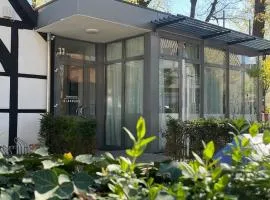 Glashaus mit 3 Gästezimmer
