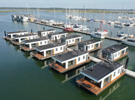 Schwimmende Häuser im BALTIC SEA RESORT, letovišče v mestu Kröslin