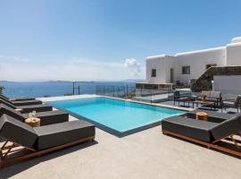 Stunning Oceanview Mykonos Villa | 5 Bedrooms | Villa Perseus | Amazing Location Overlooking Sea & Private Pool | Faros, къща тип котидж в Fanari