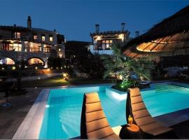 Iakovakis Suites & Spa, hôtel avec piscine à Koropi