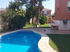 Habitación,Piscina y Jardín