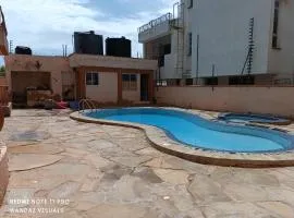 Fully furnished rooms and apartments with swimming pool