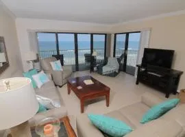 Large oceanfront balcony with pool & beach access located on the no-drive beach!