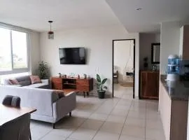 Modern and cozy apartment with hotel amenities!