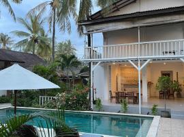 White Coconut Resort, отель в городе Гили-Траванган