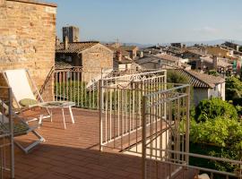 Suite Le Palme con terrazze in centro, guest house in San Gimignano