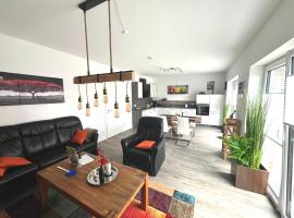 Ferienhaus "Royal Gala" Meppen Ebenerdig Carport Terrasse Neubau NETFLIX Free WIFI 2 Schlafzimmer Küche GästeWC, ξενοδοχείο σε Meppen