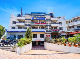 FabHotel Yashraj Inn: Vagholi şehrinde bir otel