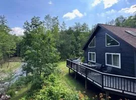 Serene Retreat on a Stream