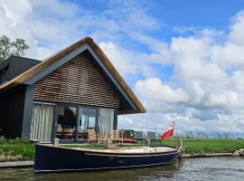 Wetterhaghe 10 - luxe vakantievilla in Friesland, HEEG -, hótel í Heeg