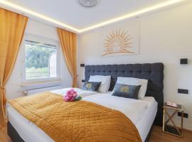CT-GOLD Penthouse Bodensdorf Amatera privater Seezugang Hallenbad, Skiarena Gerlitzen, alojamento com cozinha em Bodensdorf