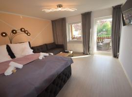 Bliss Place - 1R Premium Apartment - Kingsize Bett, Smart TV, Küche, Balkon, Waschkeller, cheap hotel in Magdeburg