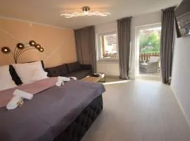 Bliss Place - 1R Premium Apartment - Kingsize Bett, Smart TV, Küche, Balkon, Waschkeller
